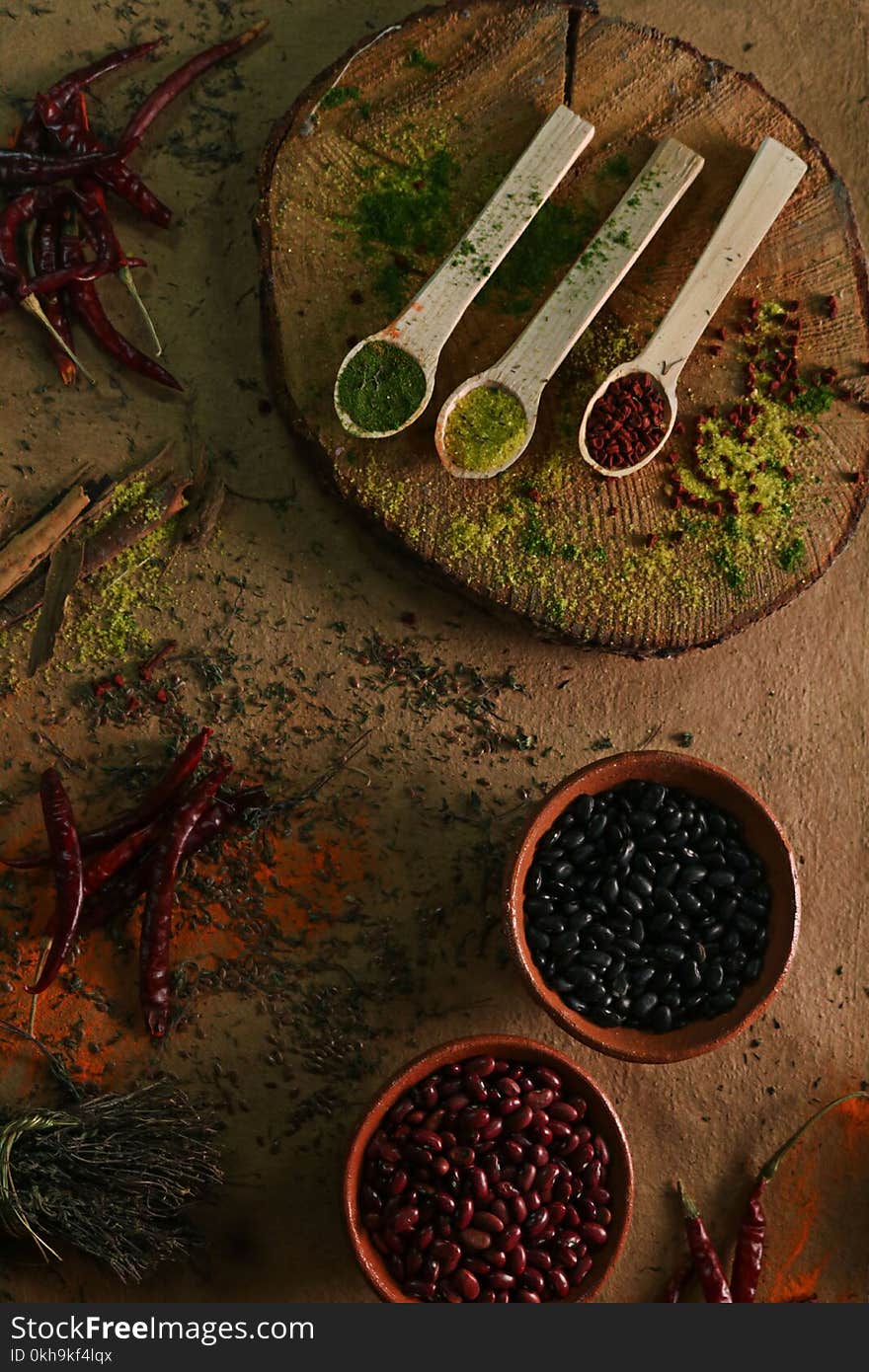 Photography of Wooden Spoons Filled with Spices