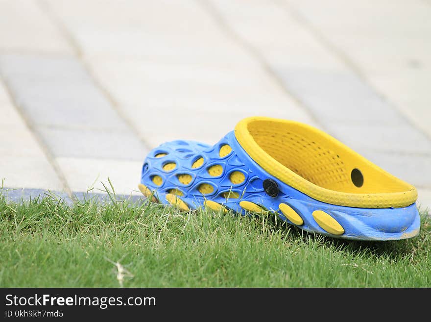 Close-up Photography of Rubber Clog