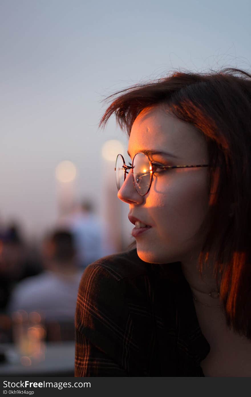 Close-Up Photography of a Woman Wearing Eyeglasses