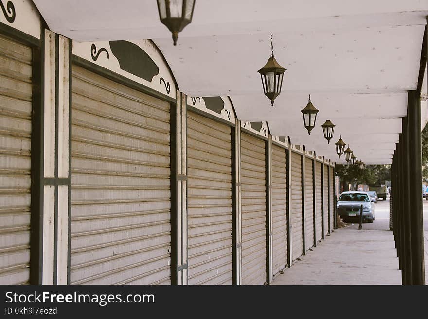 Wide Angle Photo of Gray Roller Shutters