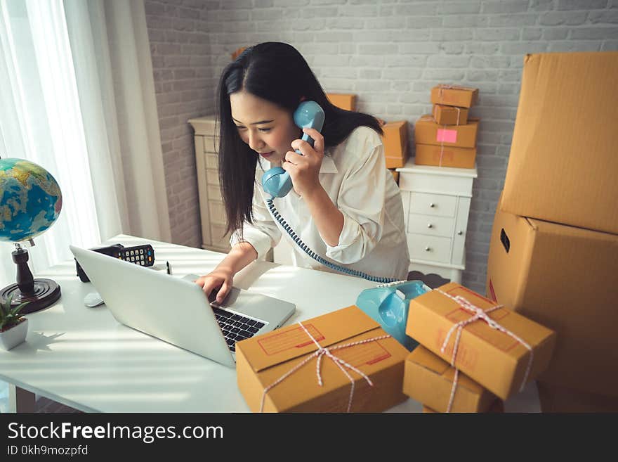 Woman Holding Gray Laptop Computer