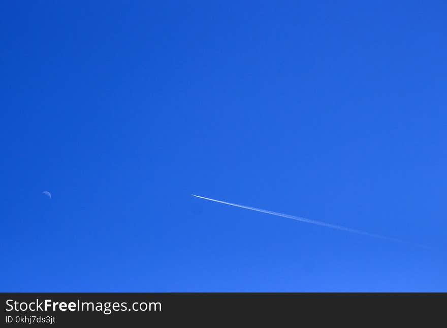 Airplane Crossing The Sky