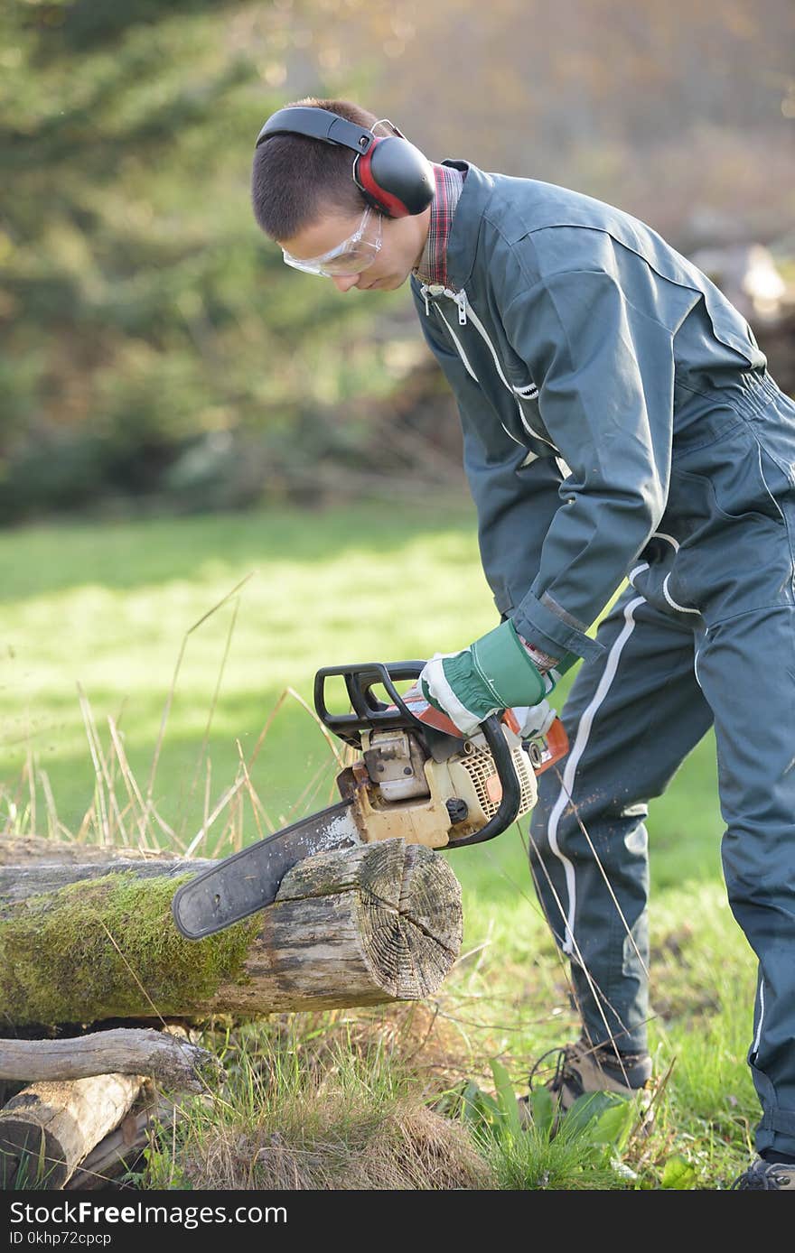 The use of a chainsaw. The use of a chainsaw