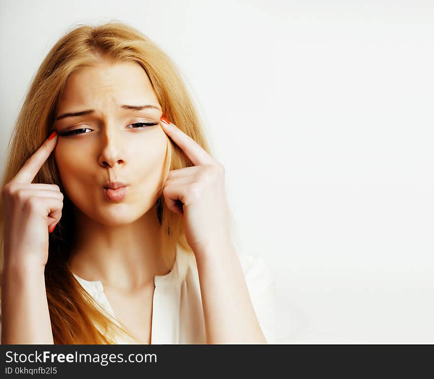 Young pretty blonde real girl presenting something at white copy space, isolated on white background gesturing emotional