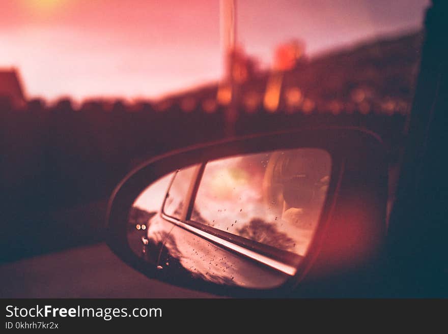 Close-Up Photography of Side Mirror During Dawn