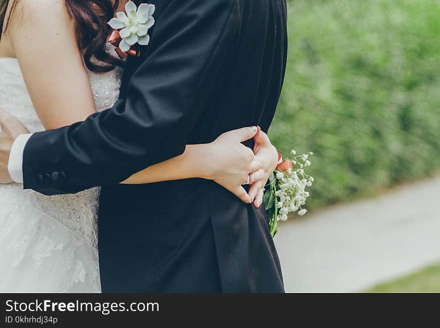 Photo of Bride and GroomHugging