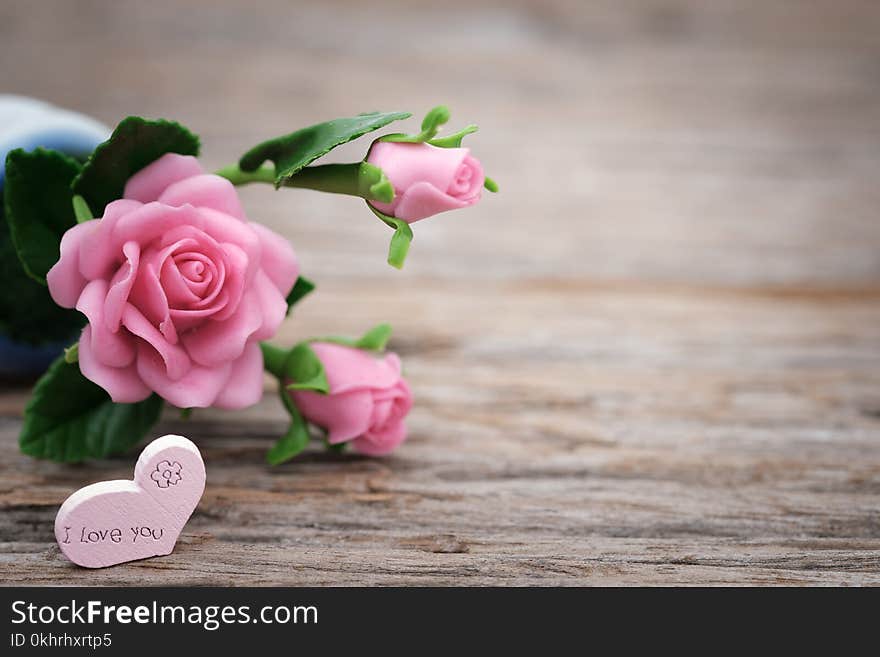 Shallow Focus Photo of Pink Ceramic Roses