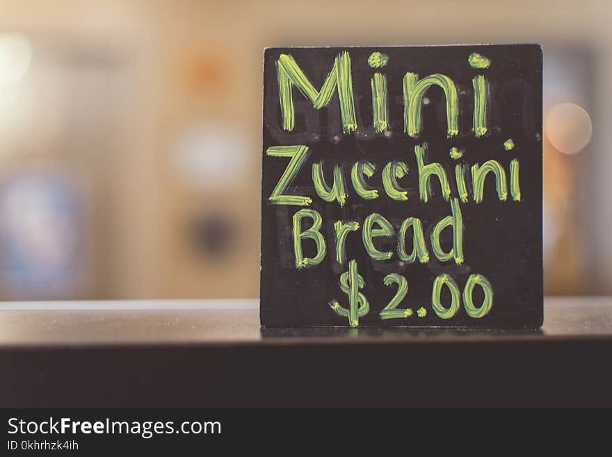 Close-up Photography of Mini Zucchini Bread Sign