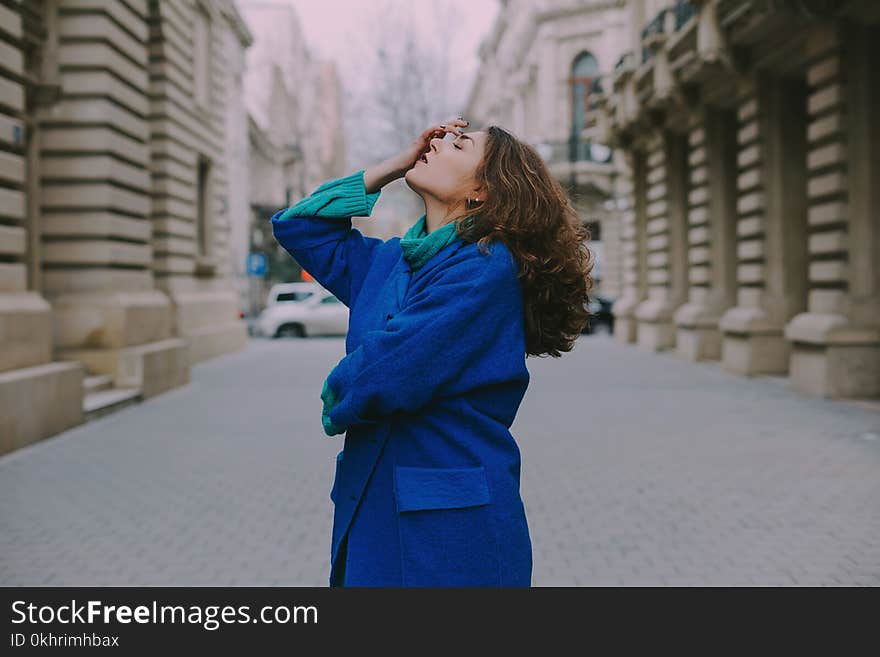 Woman Wearing Blue Coat