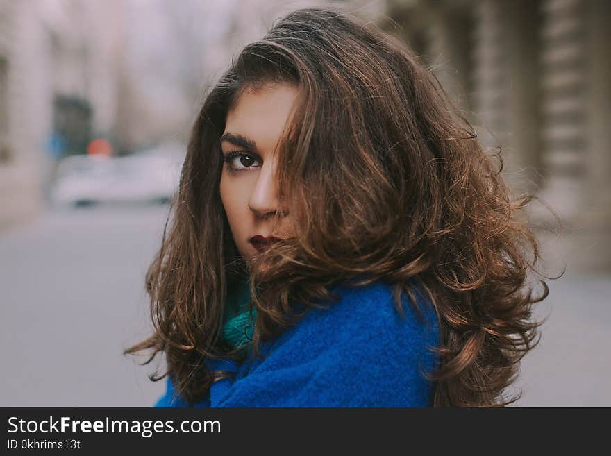 Focus Photo of Woman in Blue Top