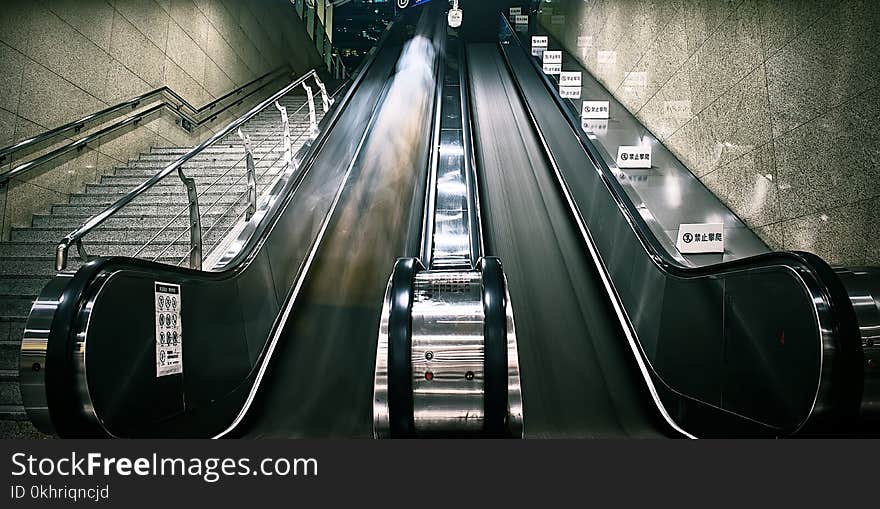 Photography of Escalator and Stairs