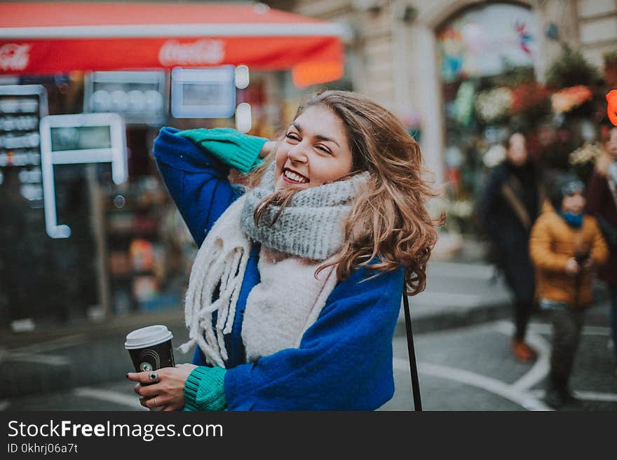 Woman in Blue Sweater