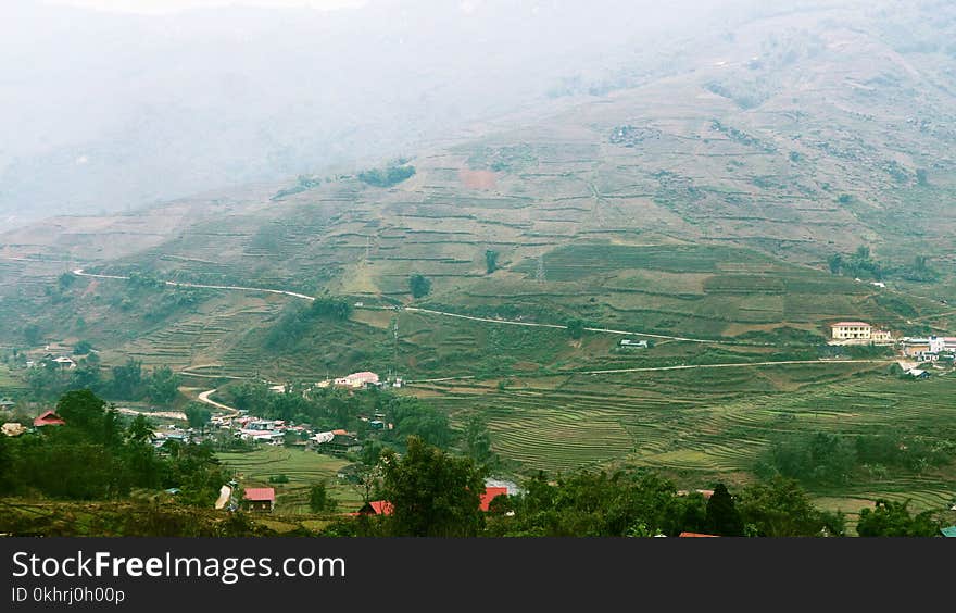 Aerial View of Mountains and Houses