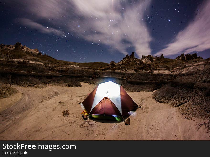 Brown and White Dome Tent at Nighttime