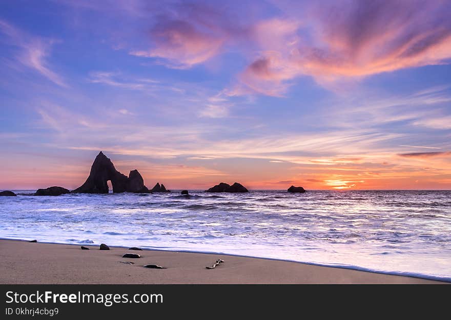 Sea and Rock Formation Photo