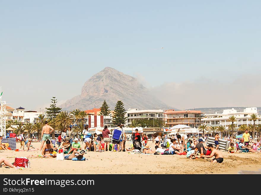 Photo of People on Seashore