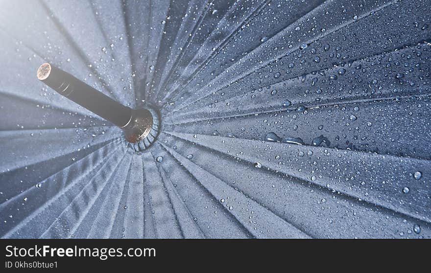 Umbrella in the rain drops