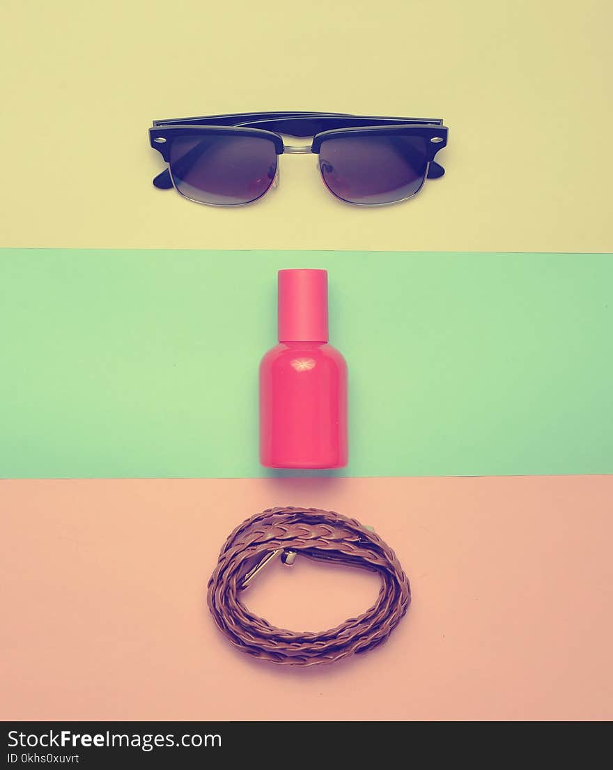 Women s trendy accessories on a multicolored pastel background.