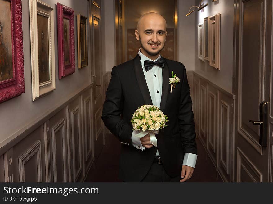 Glamour Young Husband In A Tuxedo