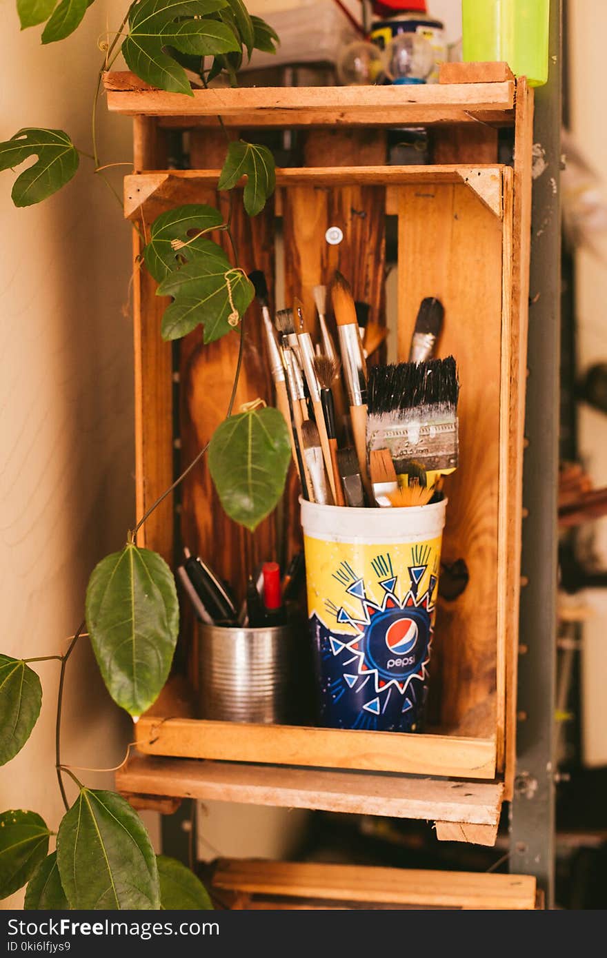 Paintbrush Set in White Container Inside Shelf