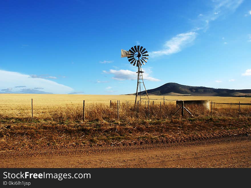 Brown and Black Wooden Wind Mill