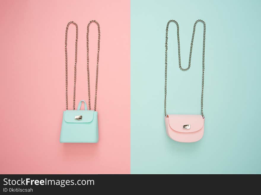 Photo of Two Teal and Pink Leather Crossbody Bags