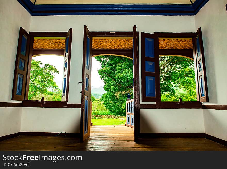 Brown Wooden Framed Windowpanes