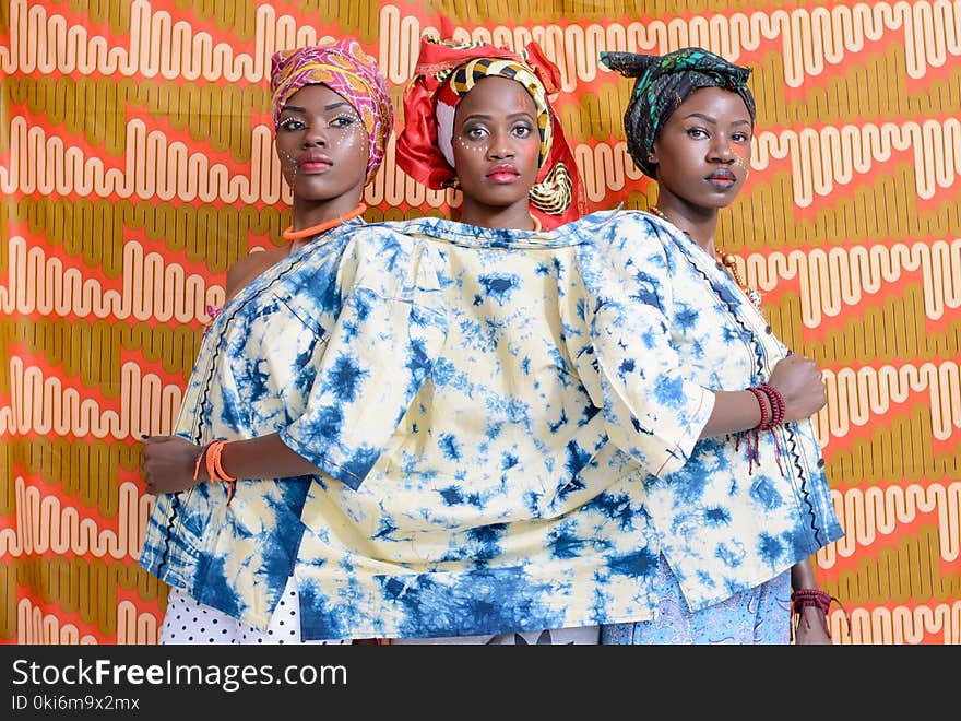 Three Women in White-and-blue Top