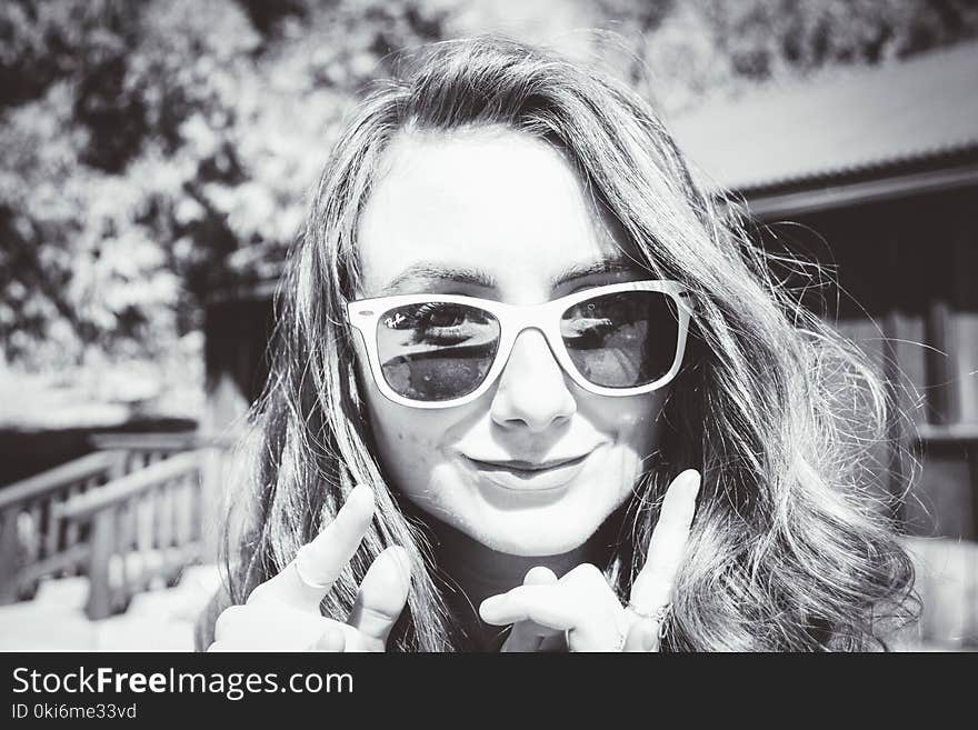 Grayscale Photography of Woman Wearing Sunglasses