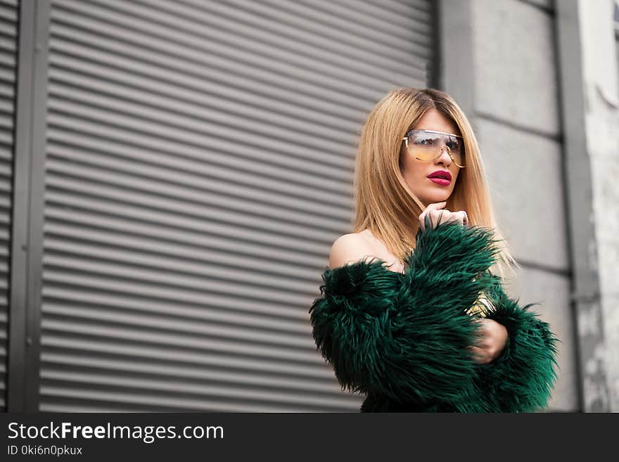 Woman in Green Off-shoulder Top