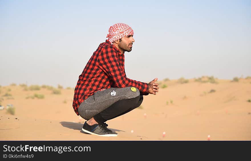 Man Wearing Red and Black Dress Shirt