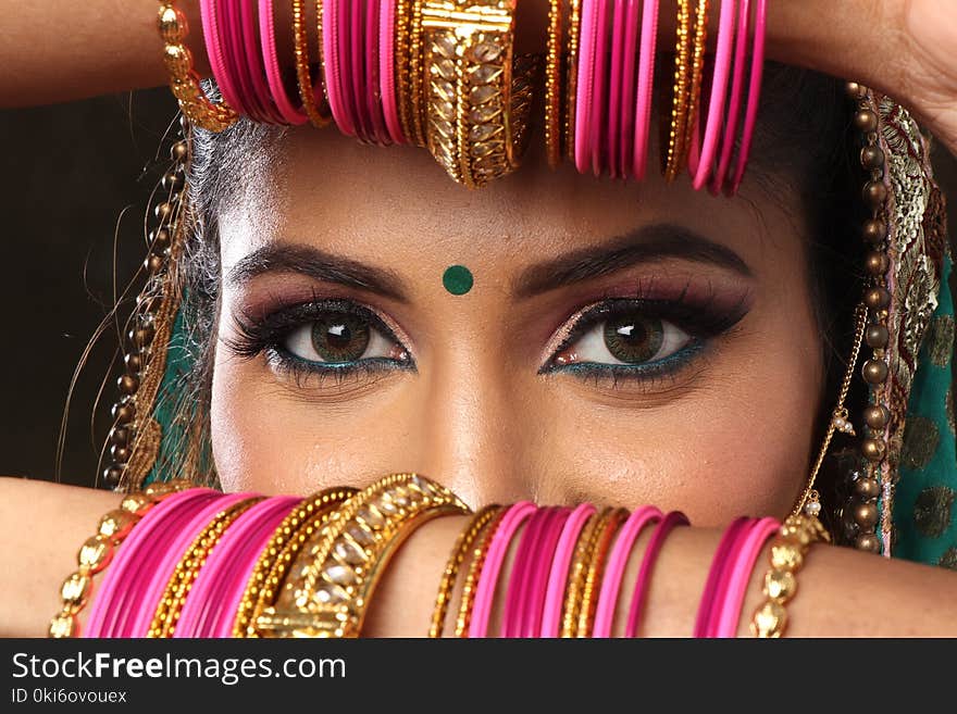 Woman Wearing Pink Bangles