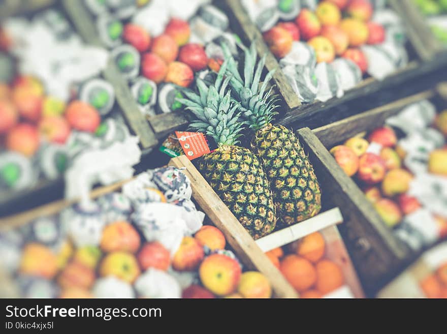 Market stall with tropical fruits and vegetables.