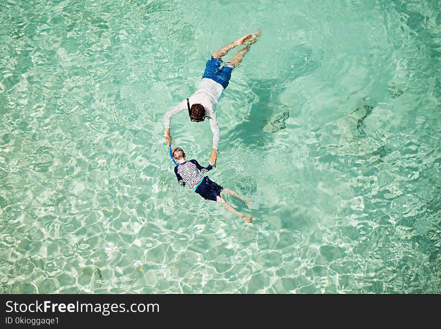 Family snorkeling together