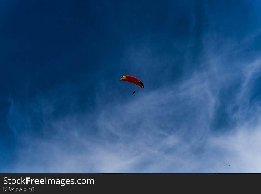 Person On Parachute Flying In The Sky