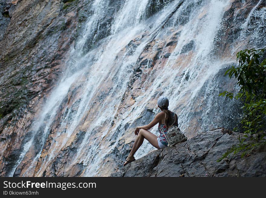 Woman Near Waterfalls