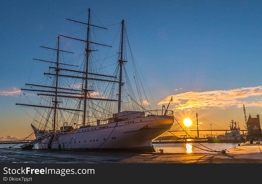 White Ship in Dock during Golden Hour