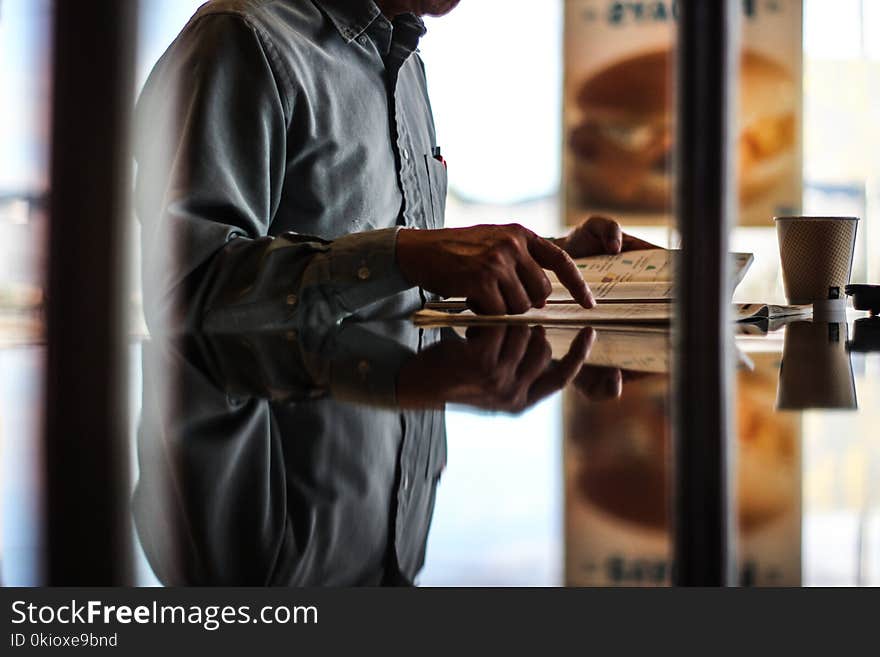 Man in Gray Button-up Shirt