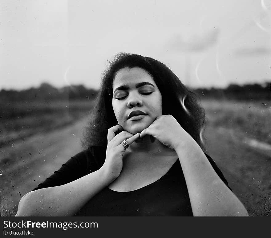 Grayscale Shallow Focus Photography of Woman in Scoop-neck Top