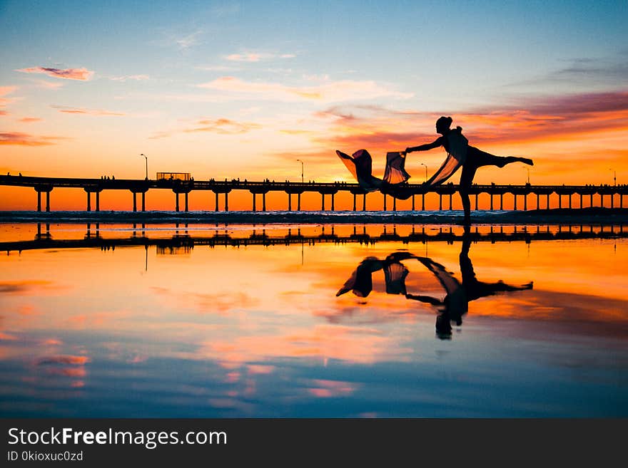 Silhouette and Mirror Photo of Girl