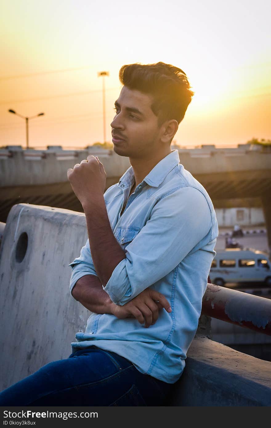 Man Wearing Blue Denim Dress Shirt