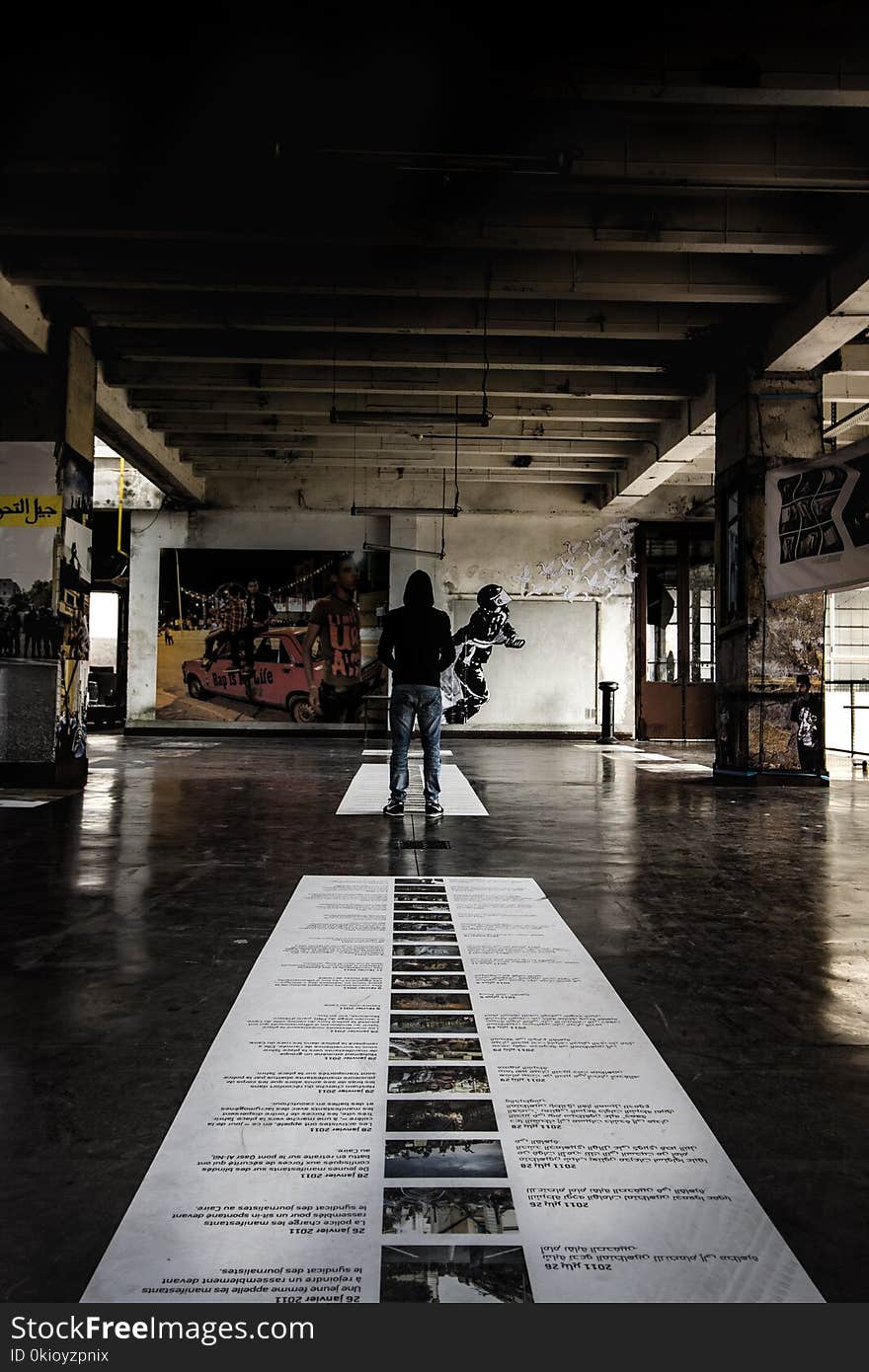 Person Standing on Ceramic Floor Tiles