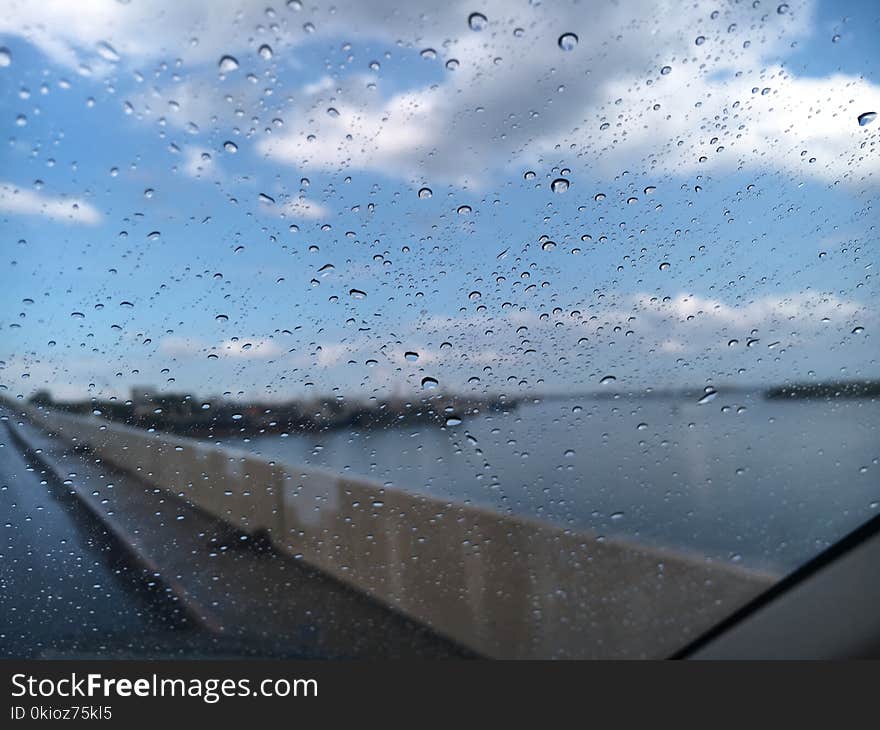 Rain Drop on Car Windshield