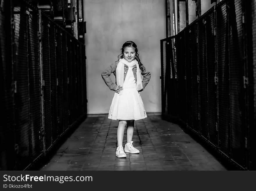 Grayscale Photo of Girl Wearing Dress