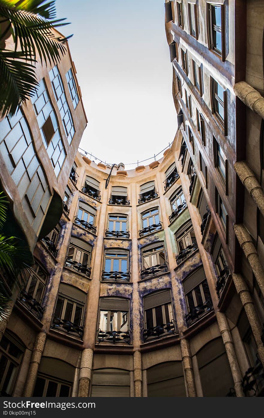 Worm&#x27;s Eye View of Brown and Black Concrete Building