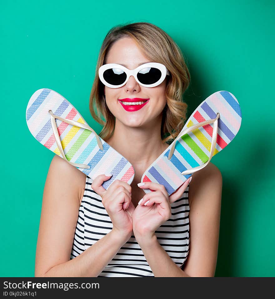 Young woman with flip flops shoes