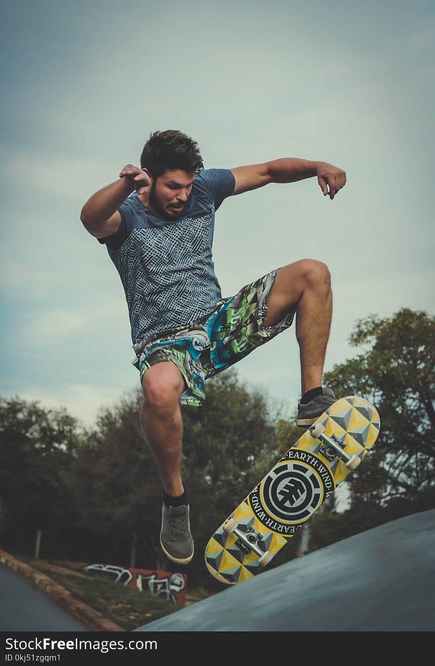 Man Playing Skateboard