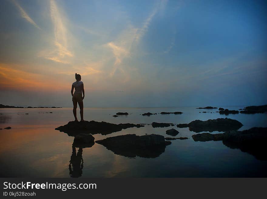 Silhouette Of Woman Standing