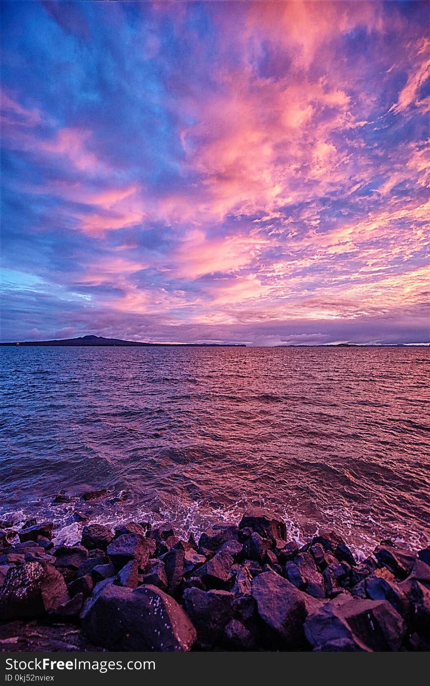 Photography Of Body Of Water During Sunset