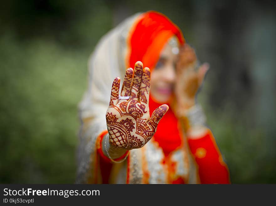 Woman With Brown Henna Tattoo